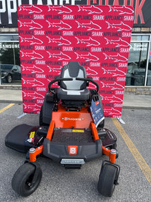 Discount Husqvarna zero-turn lawn mower at Appliance Shark. Overland Park, KS's premier scratch-dent appliance store.