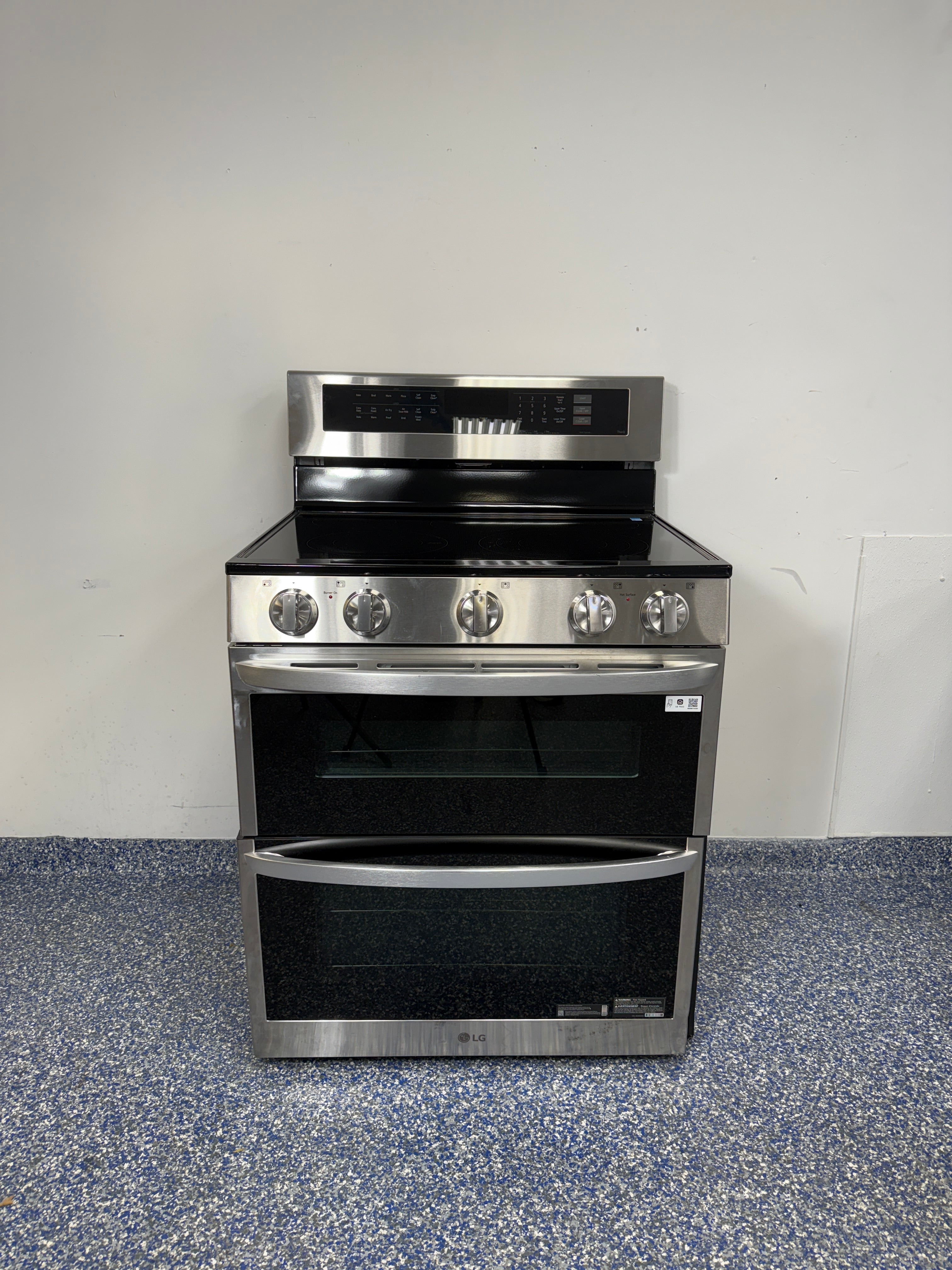 7.3 Cu.Ft. LG Electric Freestanding Range with ThinQ App, Air Sous Vide, InstaView Window, Self Clean, Hidden Bake Element, and Scan-to-Cook Feature at Appliance Shark Discount Appliance Store in Overland Park, Kansas