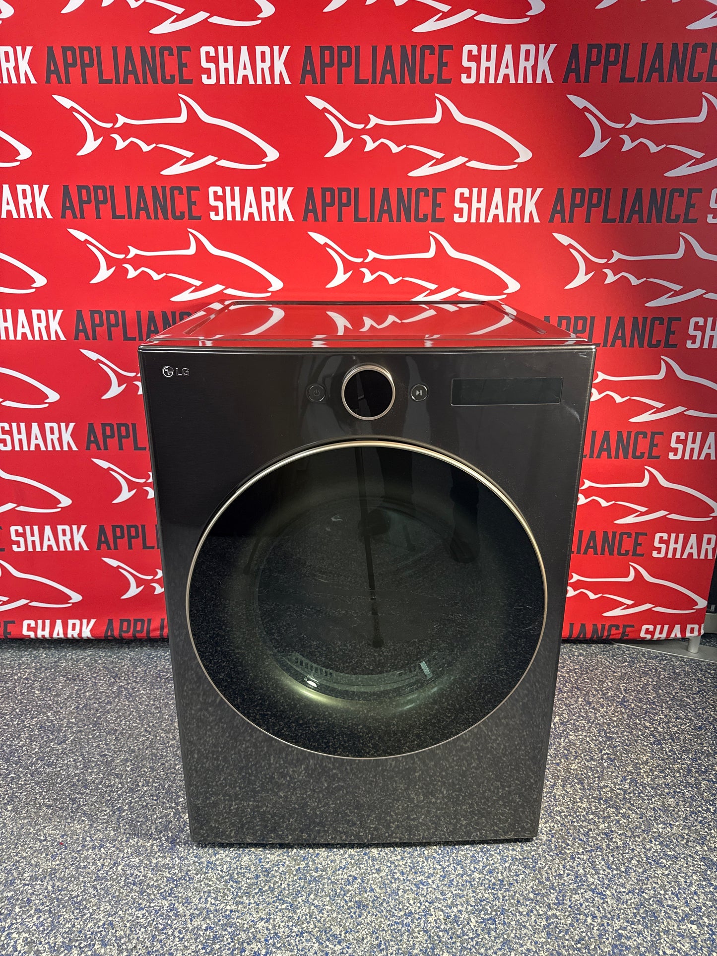 Shop this LG 7.4 cu. ft. Ultra Large Capacity Electric Dryer scratch and dent deal at Appliance Shark in Overland Park, KS.