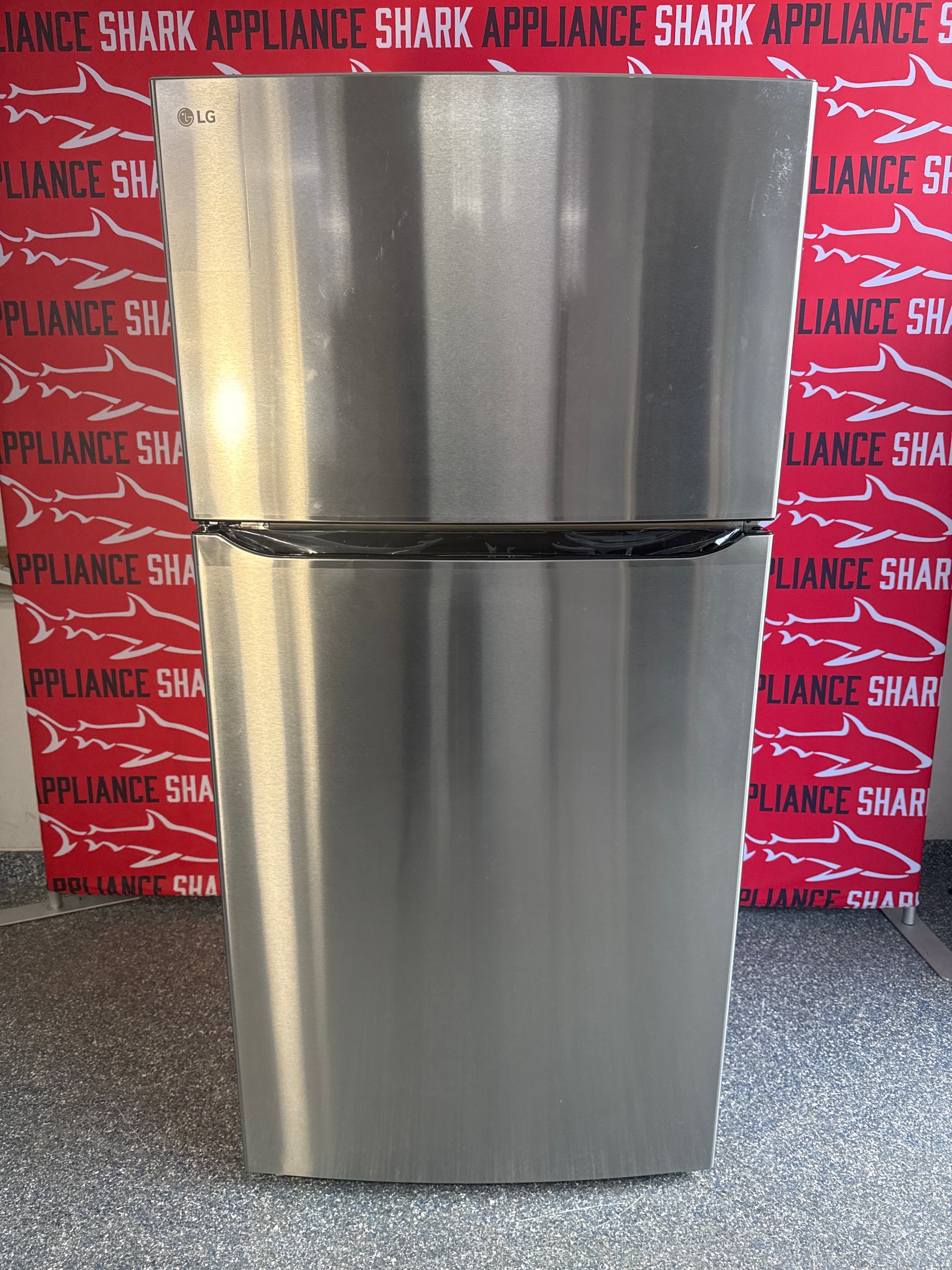 Shop this LG 24 cu. ft. Top Freezer Refrigerator scratch and dent deal at Appliance Shark in Overland Park, KS.