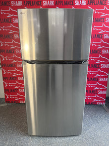 Shop this LG 24 cu. ft. Top Freezer Refrigerator scratch and dent deal at Appliance Shark in Overland Park, KS.