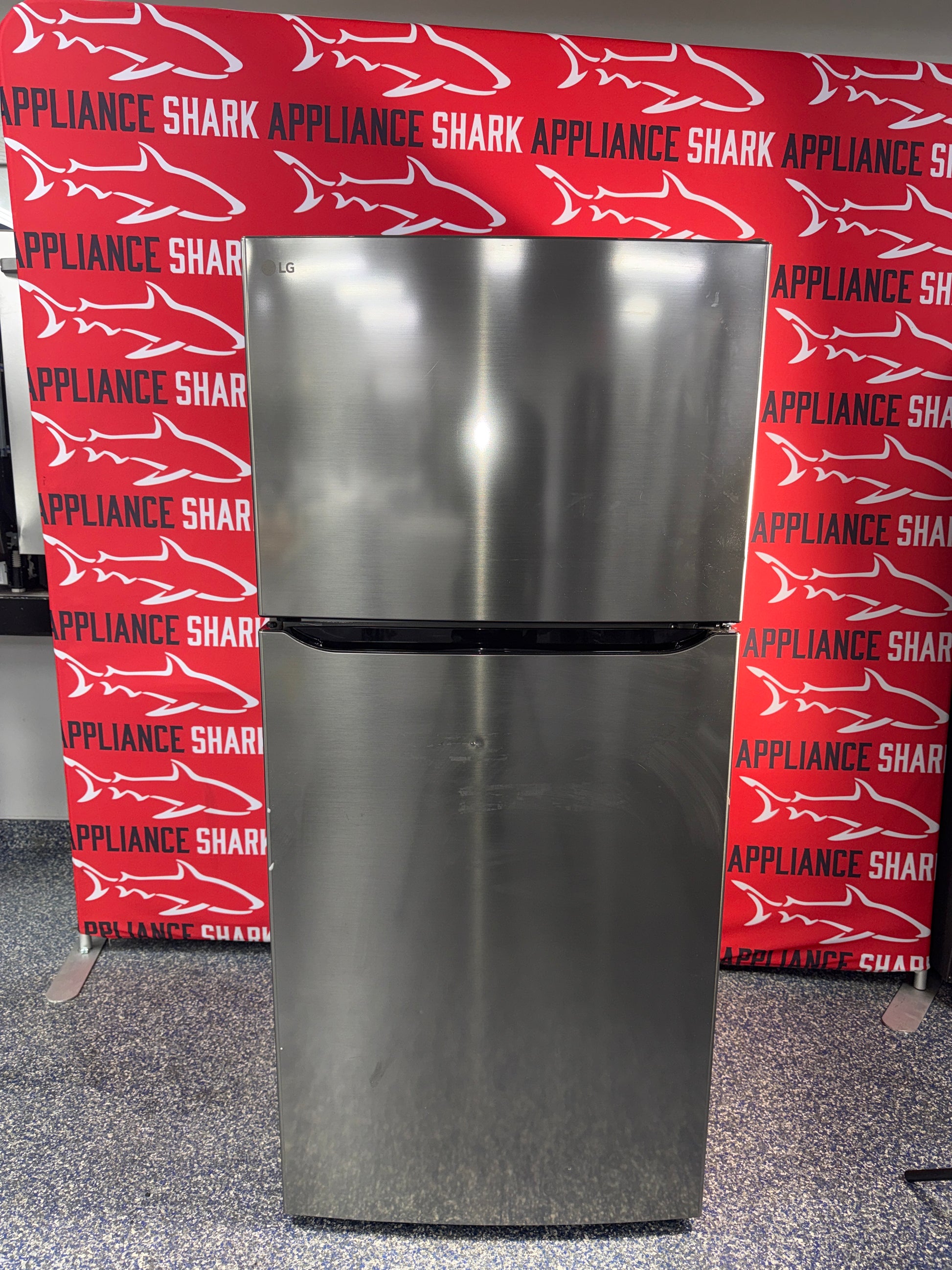 Shop this LG 20 cu. ft. Top Freezer Refrigerator scratch and dent deal at Appliance Shark in Overland Park, KS.