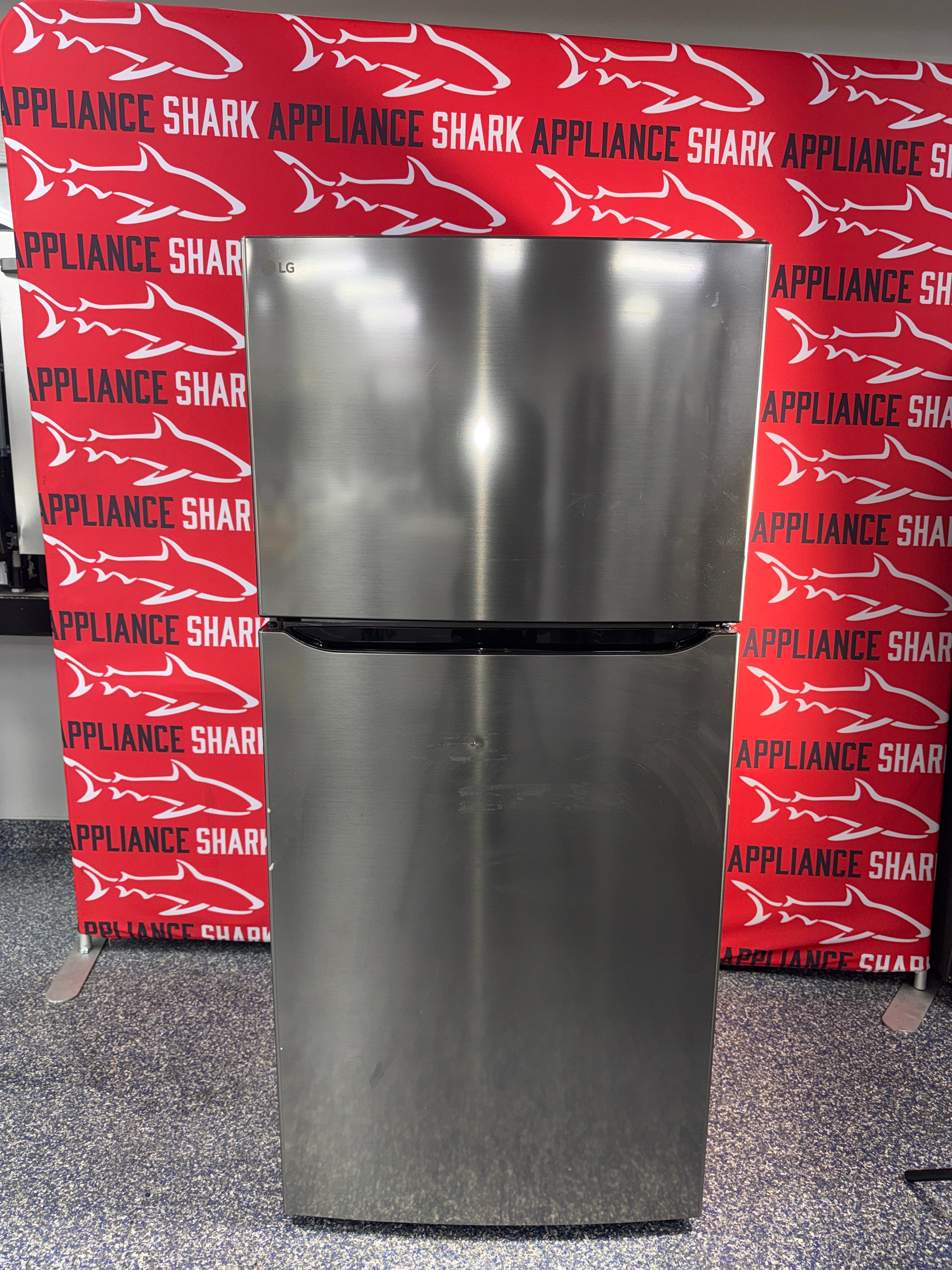 Shop this LG 20 cu. ft. Top Freezer Refrigerator scratch and dent deal at Appliance Shark in Overland Park, KS.