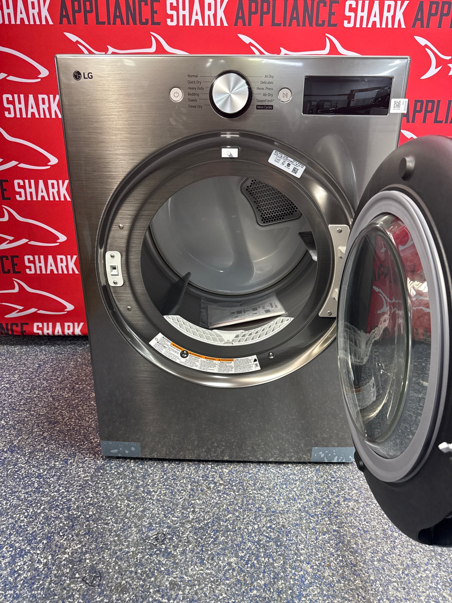 Scratch-dent LG front load electric dryer at Appliance Shark. Kansas City's best scratch-dent appliance store.