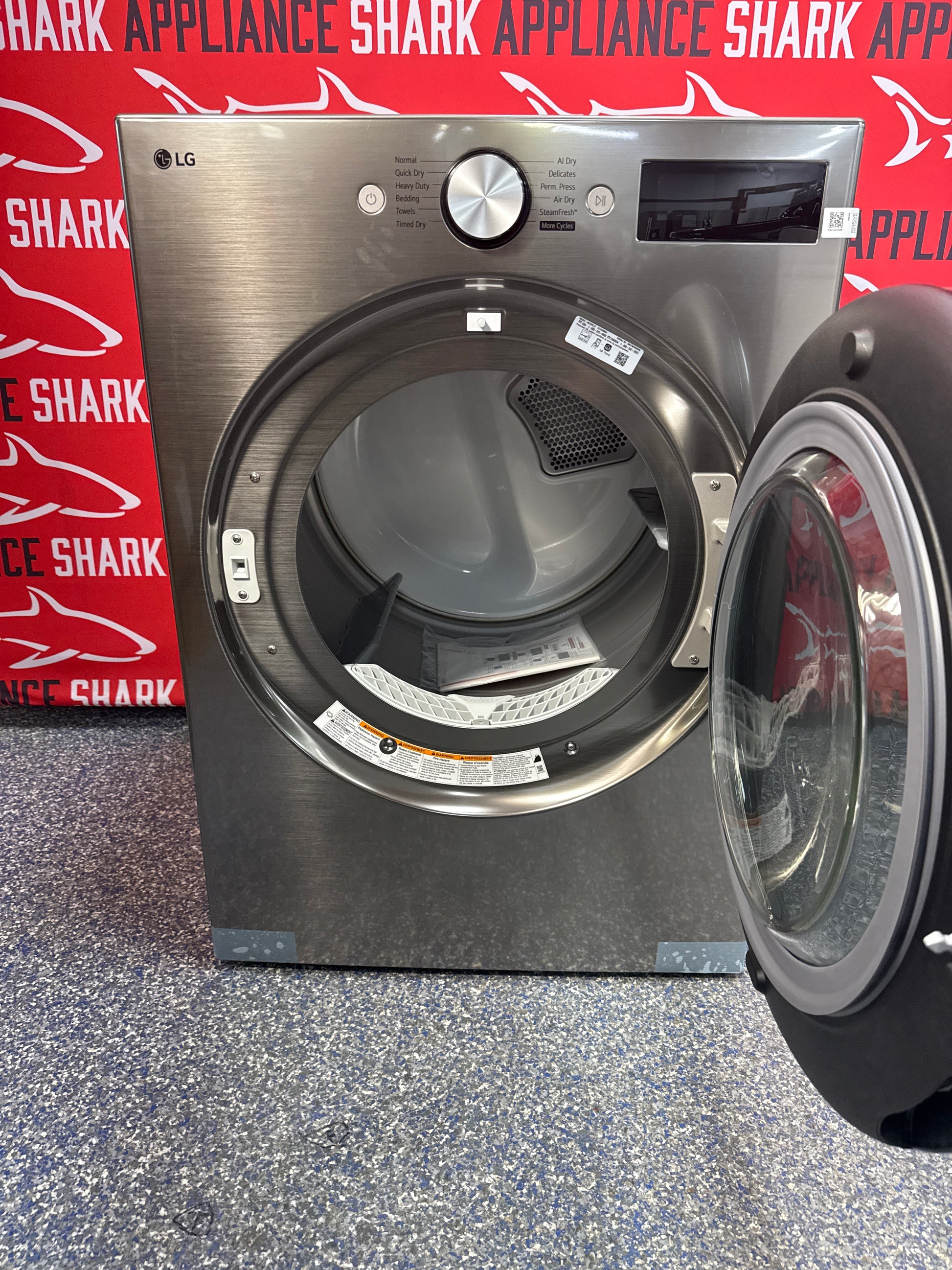 Scratch-dent LG front load electric dryer at Appliance Shark. Kansas City's best scratch-dent appliance store.
