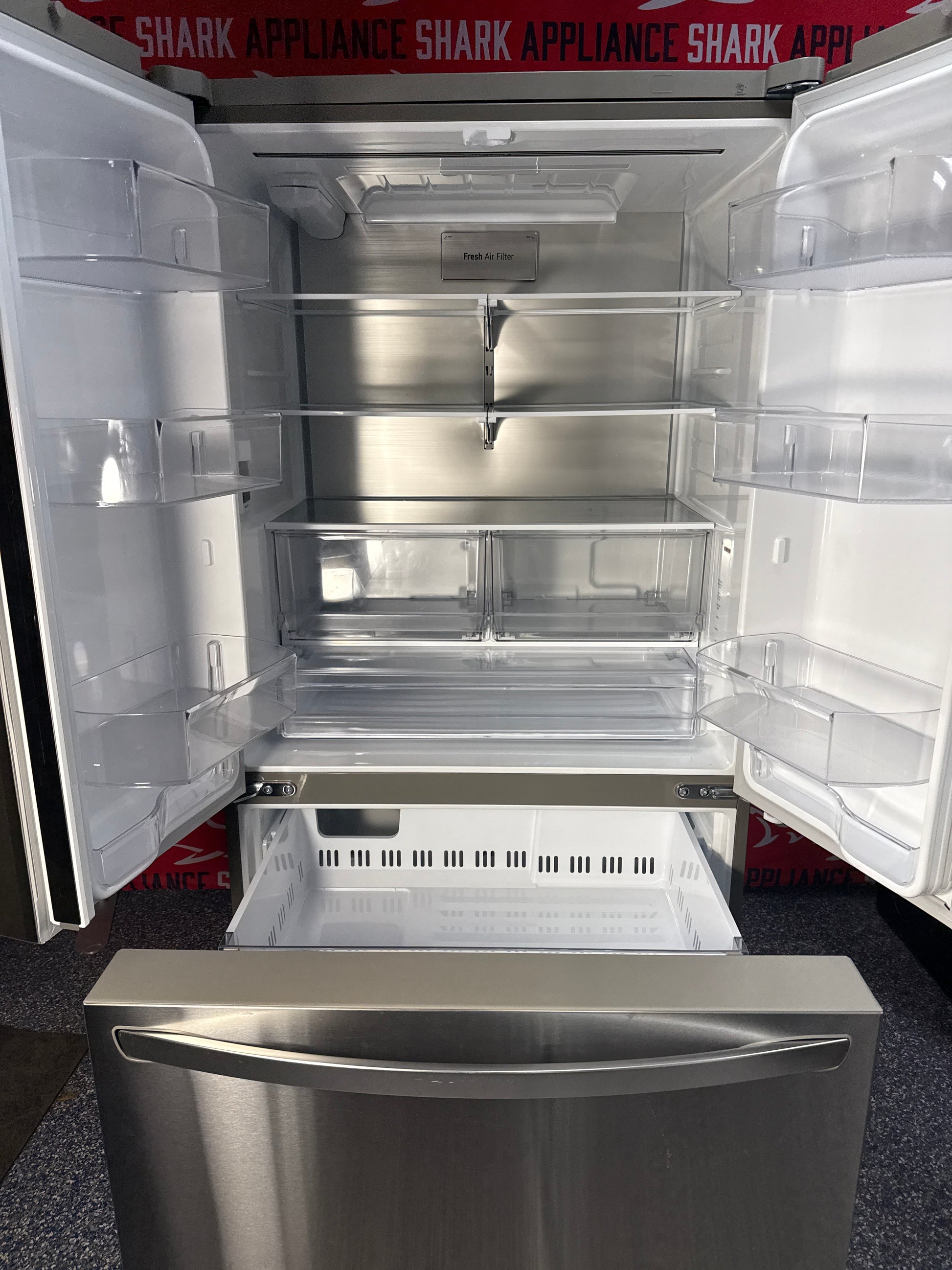 Scratch-dent LG refrigerator at Appliance Shark. Kansas City’s best appliance store.