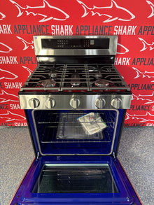 Scratch-dent LG freestanding gas range at Appliance Shark. Kansas City's best scratch-dent appliance store.