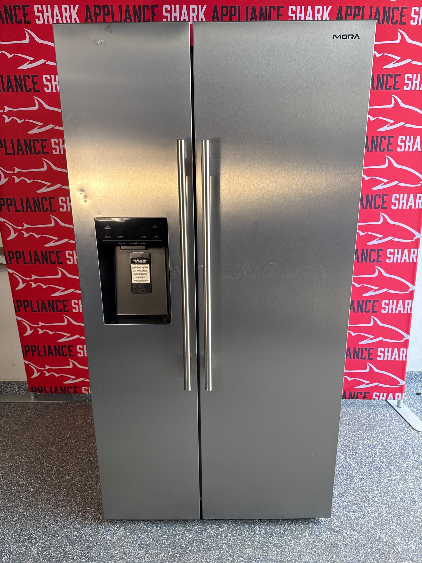 Shop this MORA 29.1 cu. ft. Side-by-Side Refrigerator scratch and dent deal at Appliance Shark in Overland Park, KS.