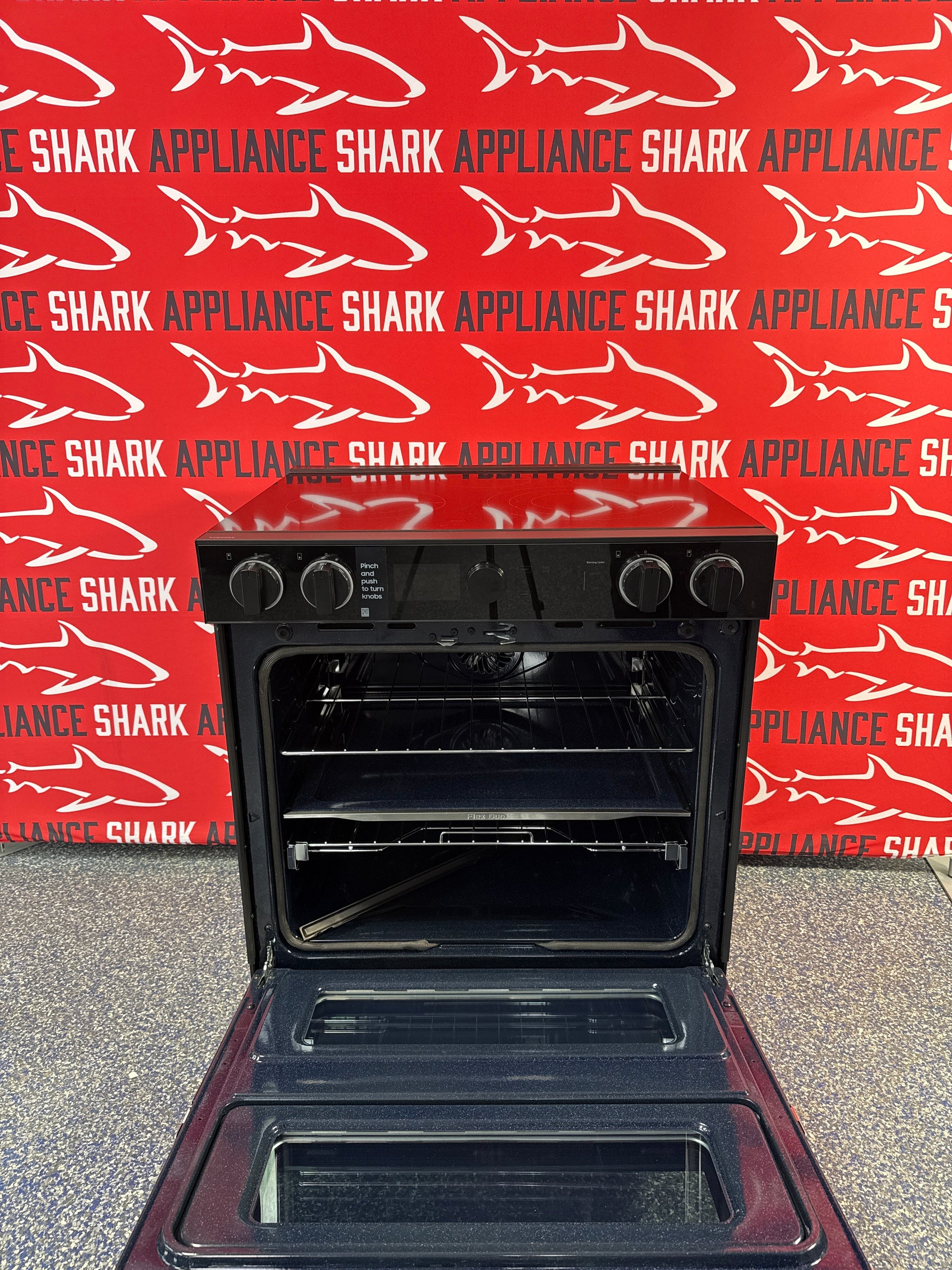 Scratch-dent SAMSUNG slide-in electric ranges at Appliance Shark. Kansas City's best scratch-dent appliance store.