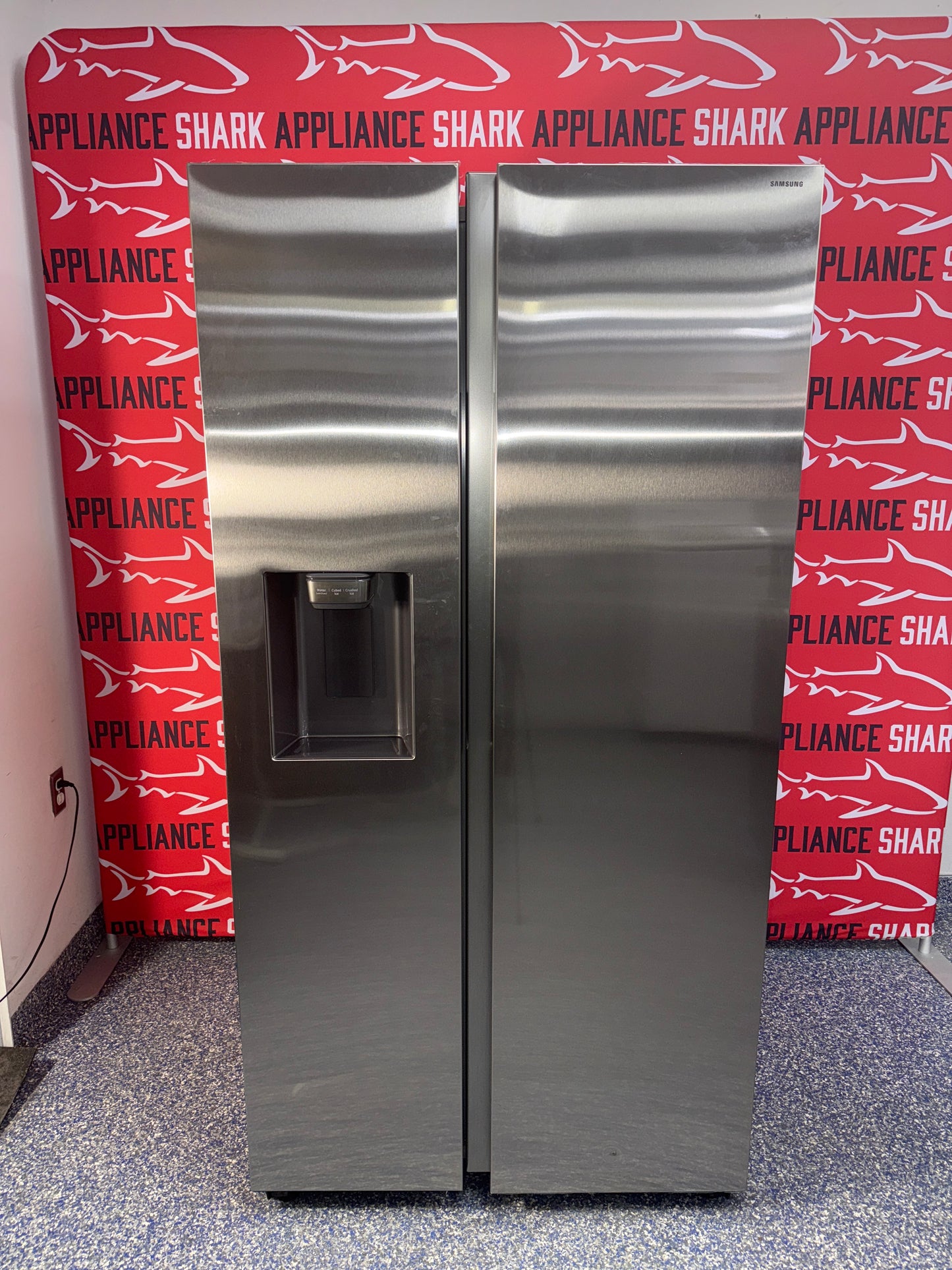 Scratch-dent Samsung side by side refrigerator at Appliance Shark. Kansas City’s best appliance store.