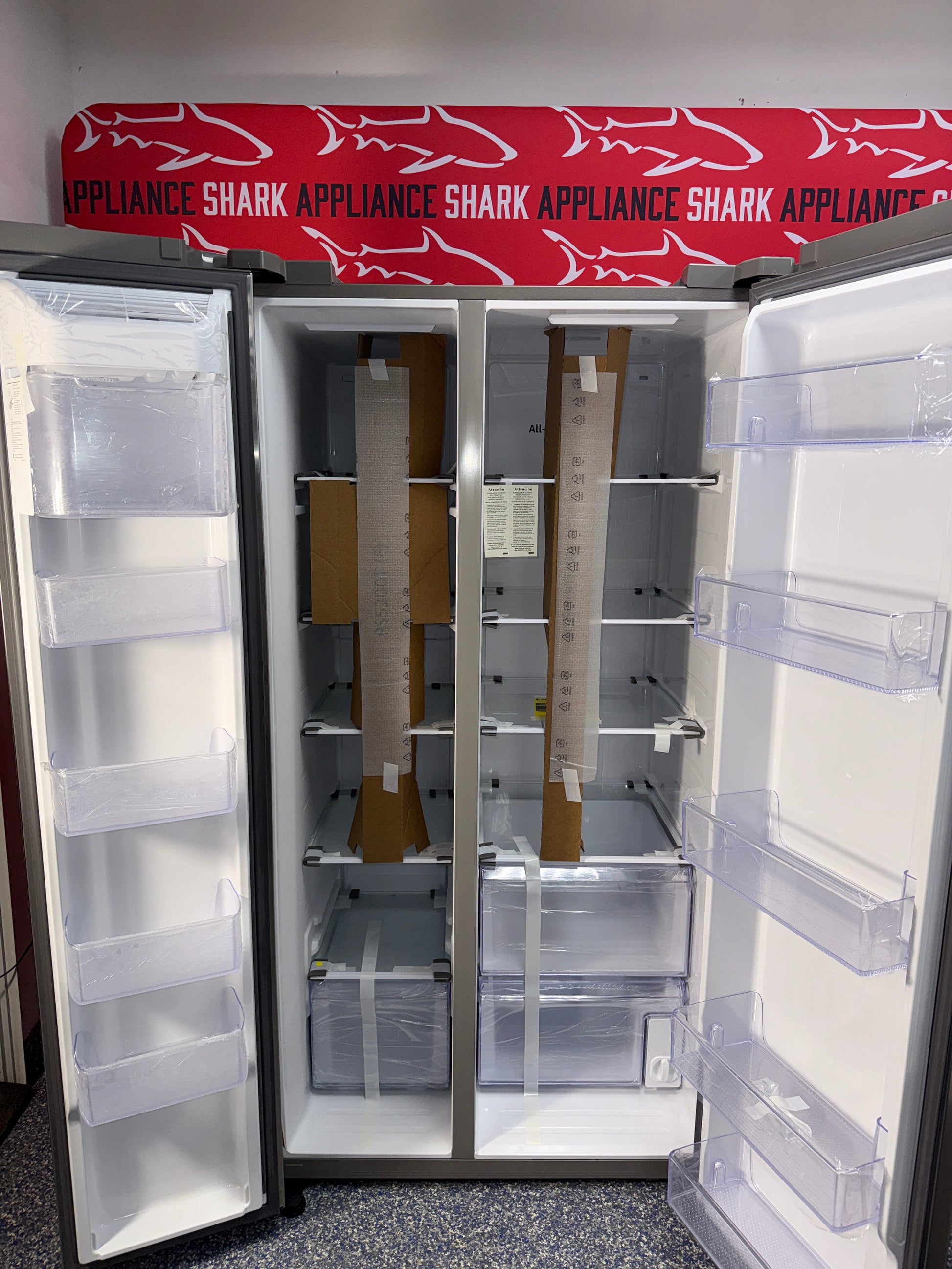 Scratch-dent SAMSUNG side by side refrigerator at Appliance Shark. Kansas City’s best appliance store.