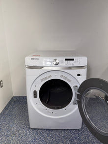 White Samsung dryer with open door at the Best Discount Appliance Store in Kansas City Metro