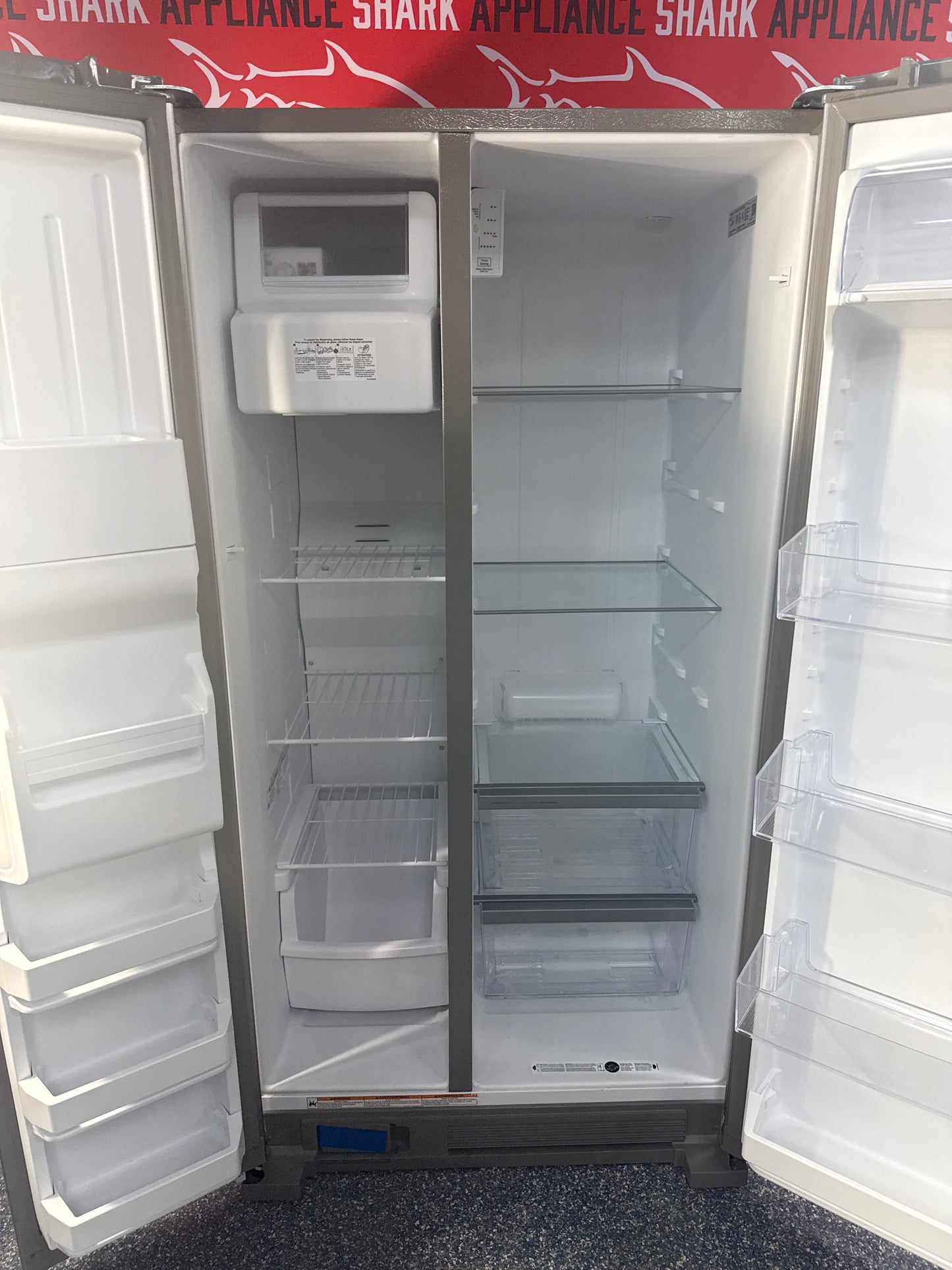 Scratch-dent WHIRLPOOL side-by-side refrigerator at Appliance Shark. Kansas City’s best refrigerator store.