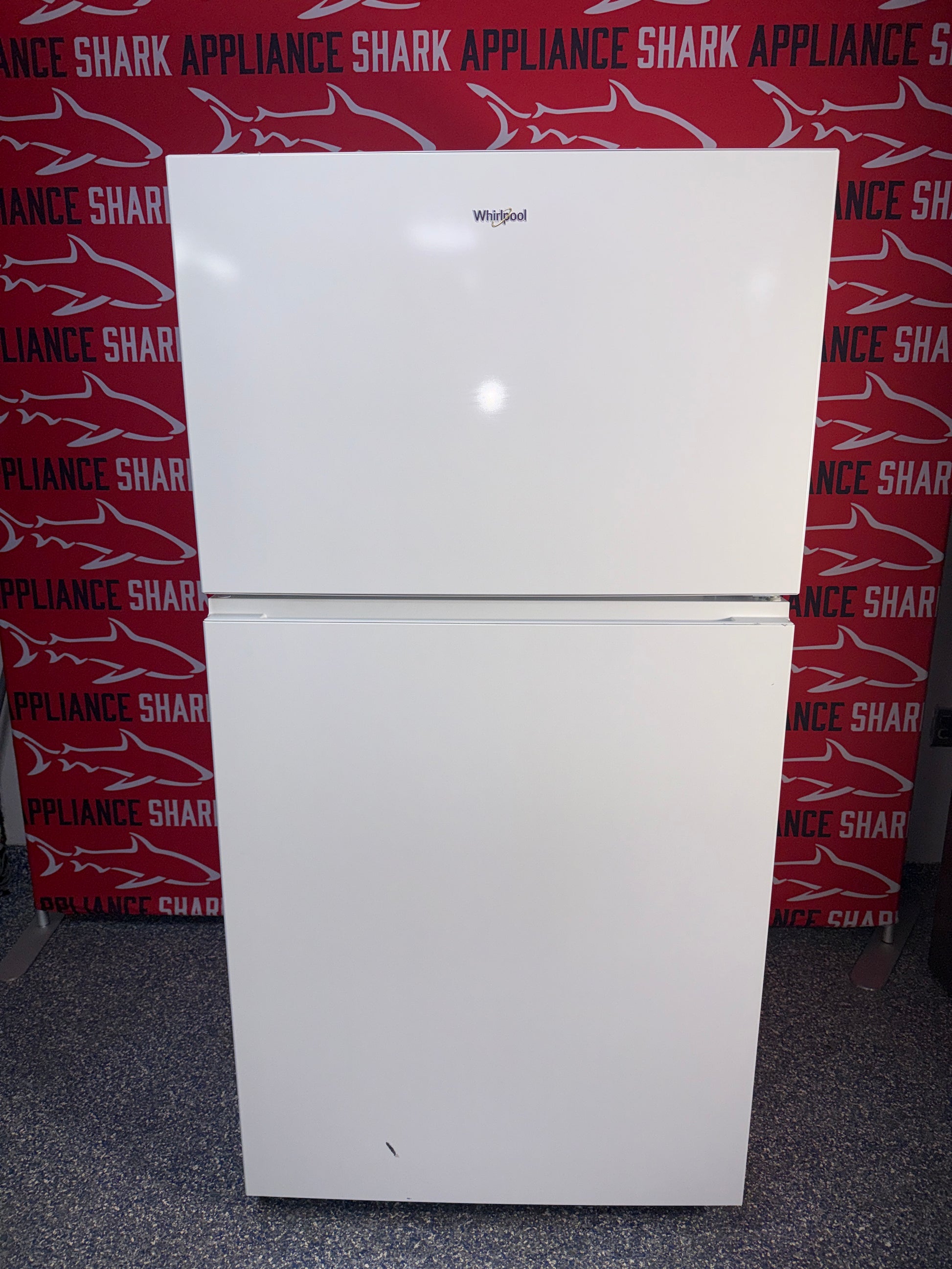 Scratch-dent Whirlpool top freezer refrigerator at Appliance Shark. Kansas City's best scratch-dent appliance store.