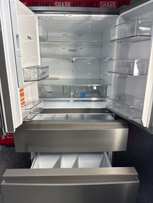 Scratch-dent Whirlpool French door refrigerator at Appliance Shark. Kansas City's best scratch-dent appliance store.