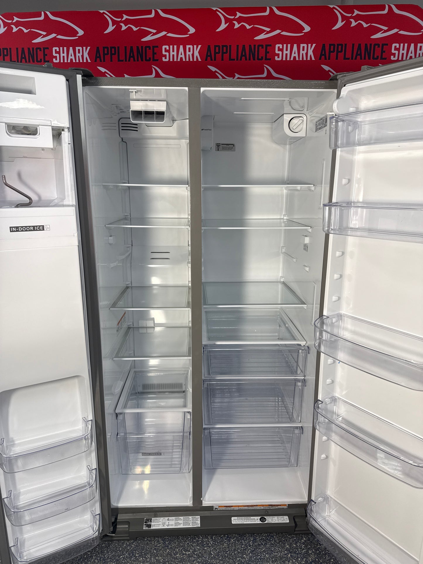 Scratch-dent WHIRLPOOL side by side refrigerator at Appliance Shark. Kansas City’s best appliance store.