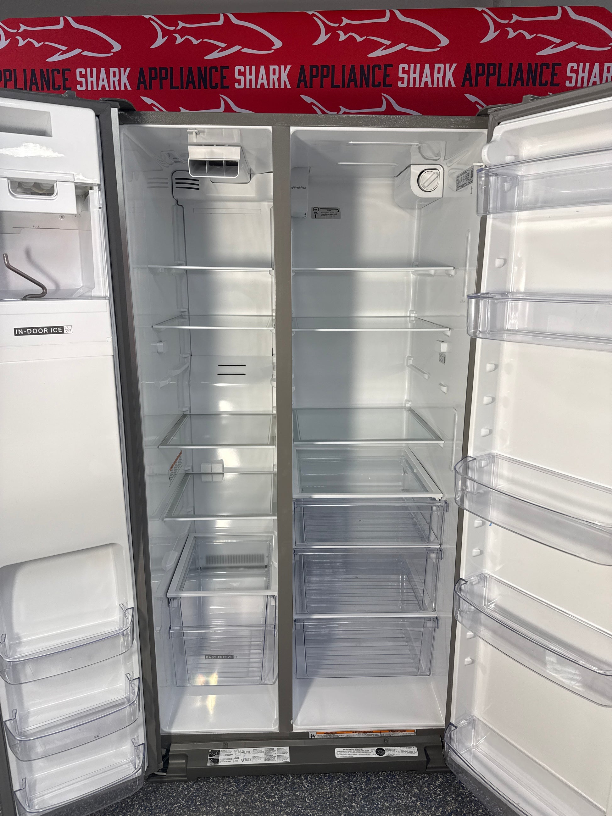 Scratch-dent WHIRLPOOL side by side refrigerator at Appliance Shark. Kansas City’s best appliance store.