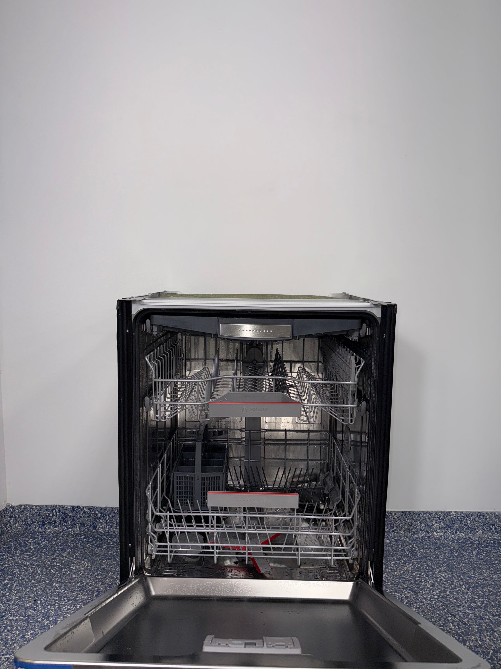 Touch controls on BOSCH SHX78CC5UC dishwasher with recessed handle, scratch and dent special in Kansas City.