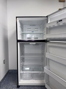 The interior of the FRIGIDAIRE FFTR1814WB refrigerator, showcasing its adjustable shelves, an ideal appliance for homes in Overland Park.