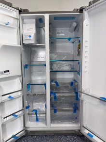 The interior of the FRIGIDAIRE refrigerator, model GRSC2352AF, showing its EvenTemp Cooling System, an ideal appliance for homes in Overland Park, KS.