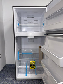 The interior of the FRIGIDAIRE FRTE1835AV refrigerator, showing its EvenTemp Cooling System, an ideal appliance for homes in Overland Park, KS.