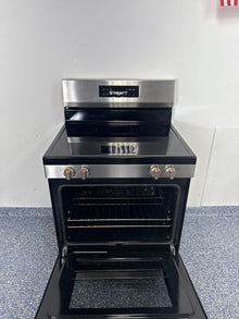 Smooth-surface cooktop with five heating elements on the FRIGIDAIRE FCRE306LAF in the Kansas City Metro area.