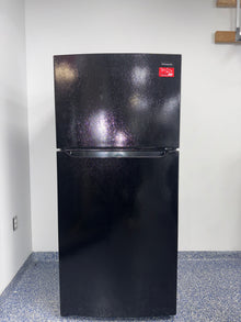 The FRIGIDAIRE FFTR1814WB refrigerator from the front, a top-freezer model for a great deal in Kansas.