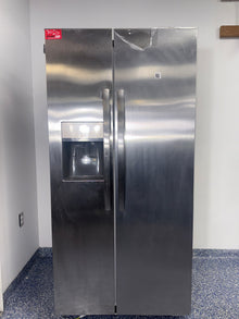 The FRIGIDAIRE FRSS2323AS refrigerator from the front, a side-by-side model for a great deal in Kansas.