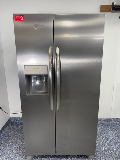 Front view of the FRIGIDAIRE FRSS26L3AF side-by-side refrigerator in a Kansas City kitchen.
