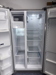 Close-up of the external water & ice dispenser on the FRIGIDAIRE FRSS26L3AF, showcased for Overland Park, KS households.