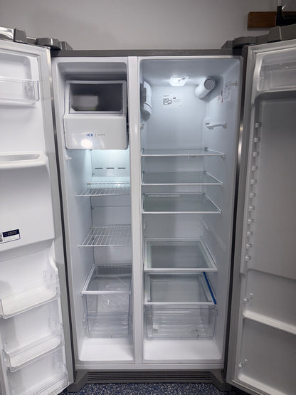 Close-up of the external water & ice dispenser on the FRIGIDAIRE FRSS26L3AF, showcased for Overland Park, KS households.