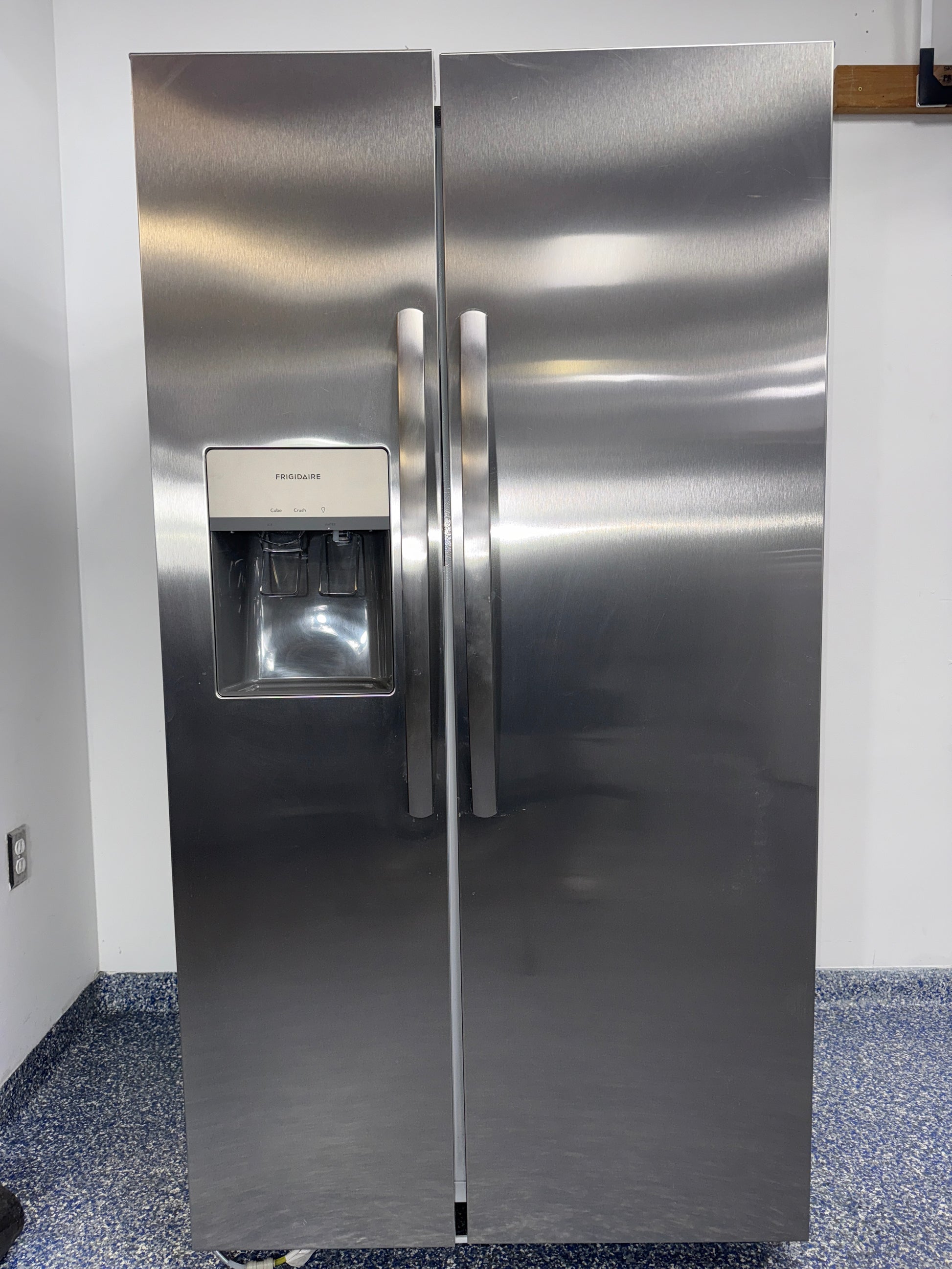 Front view of the FRIGIDAIRE FRSS26L3AF side-by-side refrigerator in stainless steel, available in Overland Park, KS.