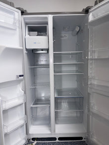 Interior view of the FRIGIDAIRE FRSS26L3AF refrigerator showing adjustable glass shelves and storage capacity for Overland Park, KS homes.
