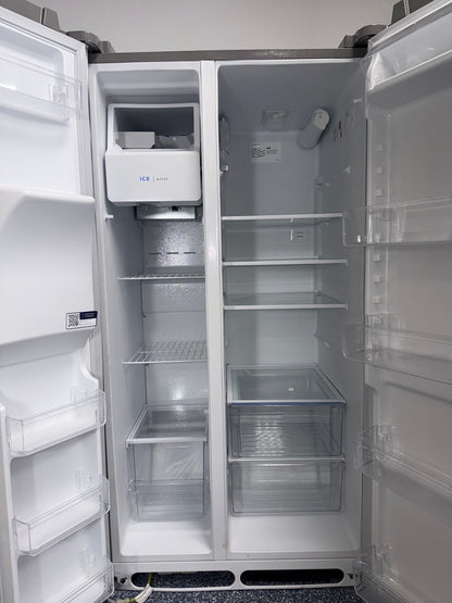 Interior view of the FRIGIDAIRE FRSS26L3AF refrigerator showing adjustable glass shelves and storage capacity for Overland Park, KS homes.