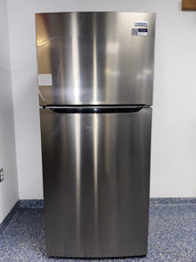 The FRIGIDAIRE FRTE1835AV refrigerator from the front, a Garage Ready model for a great deal in Kansas.