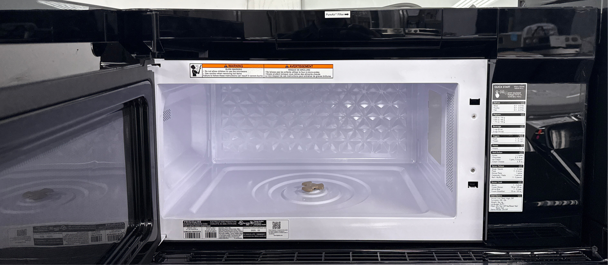  The sleek exterior of the Frigidaire Gallery over-the-range microwave, showcasing its style and features for kitchens in the Overland Park, Kansas area.