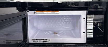  The sleek exterior of the Frigidaire Gallery over-the-range microwave, showcasing its style and features for kitchens in the Overland Park, Kansas area.