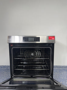 Induction cooktop surface of FRIGIDAIRE GCFI3060BF range, available as a scratch and dent deal in Kansas City.