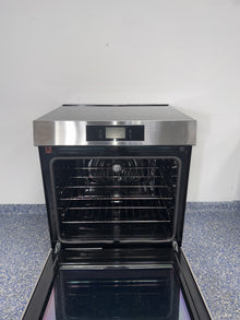 Induction cooktop surface on the FRIGIDAIRE GCFI3060BFE range in the Kansas City Metro area.