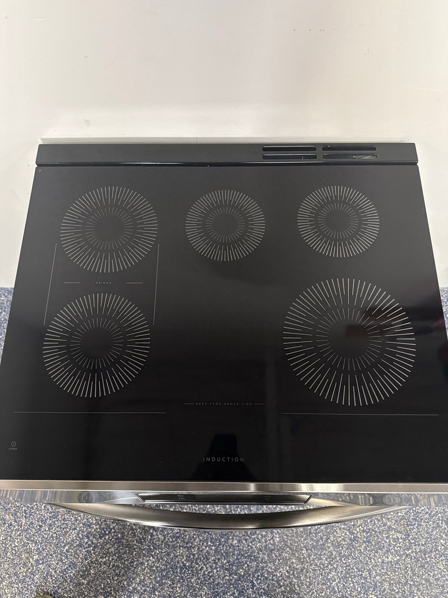 Oven interior of the FRIGIDAIRE GCFI3060BFE induction range on display in Overland Park, KS.