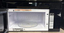 FRIGIDAIRE GMOS1964ADA over-the-range microwave full width door front view in Kansas City