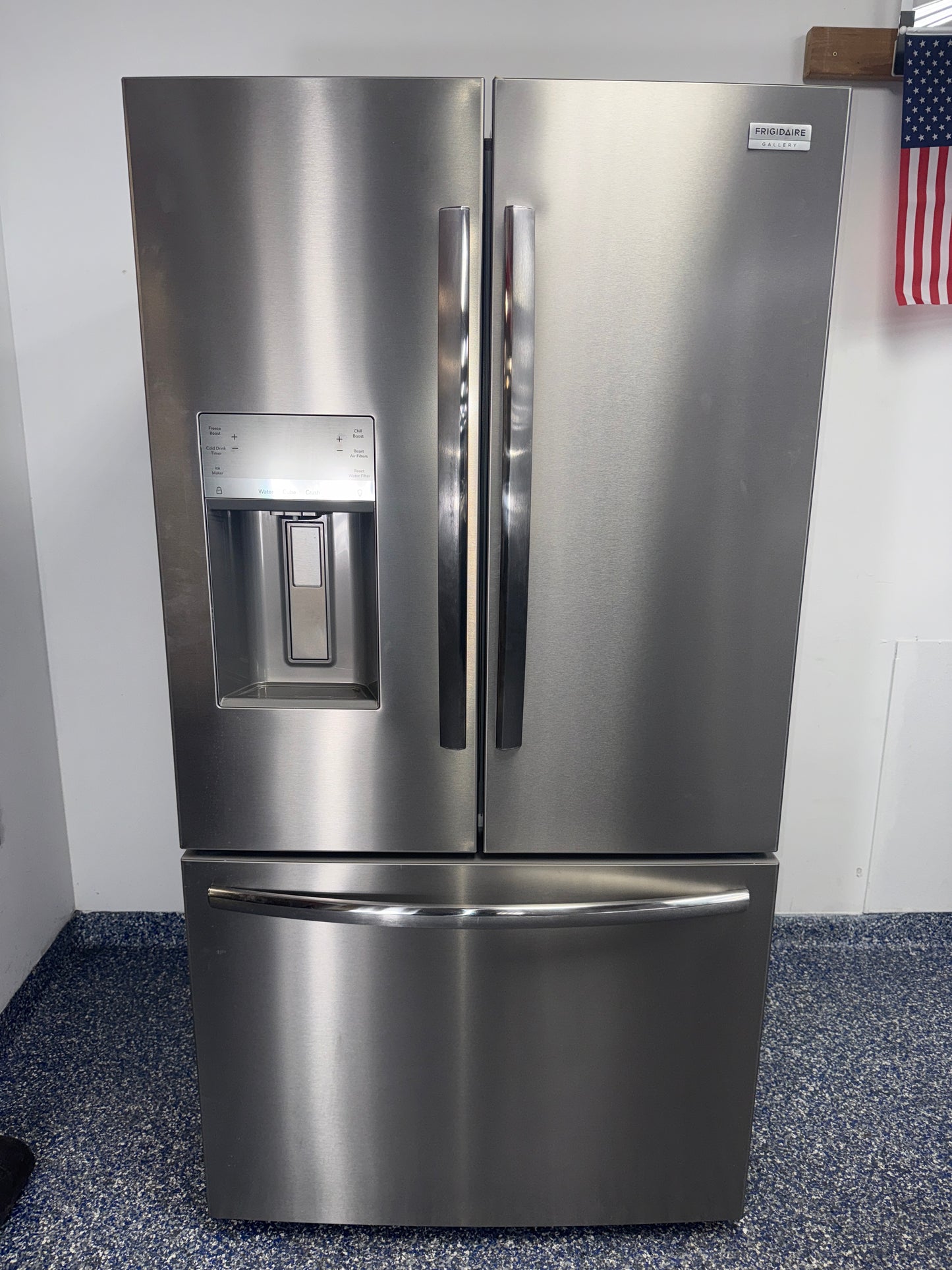 Front view of the FRIGIDAIRE GRFS2853AFM French door refrigerator with stainless steel finish in a Kansas City kitchen.