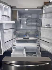 Interior view of the FRIGIDAIRE GRFS2853AFM refrigerator showing wide adjustable shelves and storage capacity for Overland Park, KS homes.