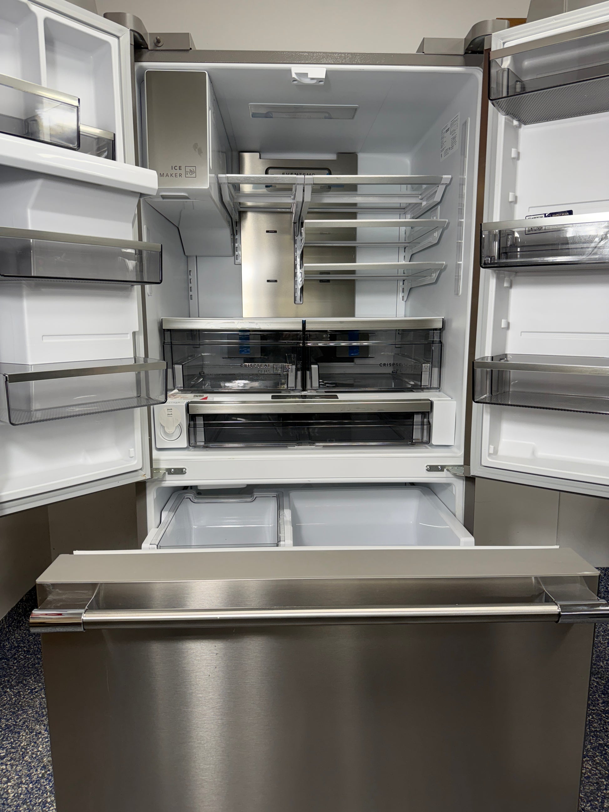 An overhead shot of the FRIGIDAIRE PRFS2883AF with both French doors open, showcasing the flexible SpaceWise® Organization System and LED lighting. On sale at Appliance Shark - Scratch & Dent store | Kansas City.