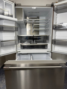 An overhead shot of the FRIGIDAIRE PRFS2883AF with both French doors open, showcasing the flexible SpaceWise® Organization System and LED lighting. On sale at Appliance Shark - Scratch & Dent store | Kansas City.
