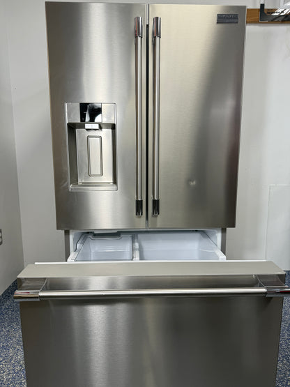 A view inside the bottom freezer drawer of the PRFS2883AF refrigerator, showing the wire basket and pull-out shelf for organized storage. On sale at Appliance Shark - Scratch & Dent store | Kansas City.