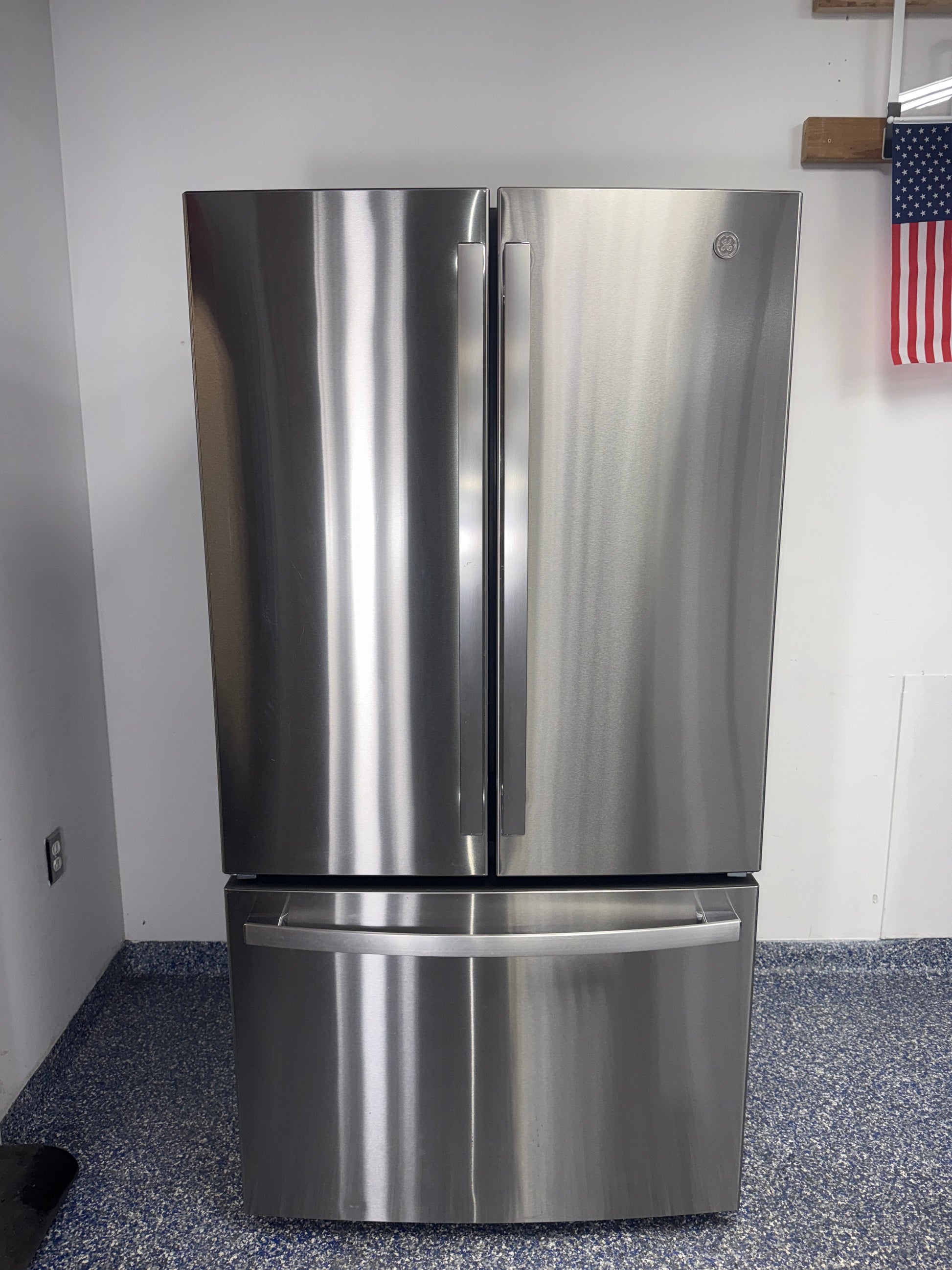 GE GNE27JYMFS French door refrigerator front view in Overland Park Kansas City