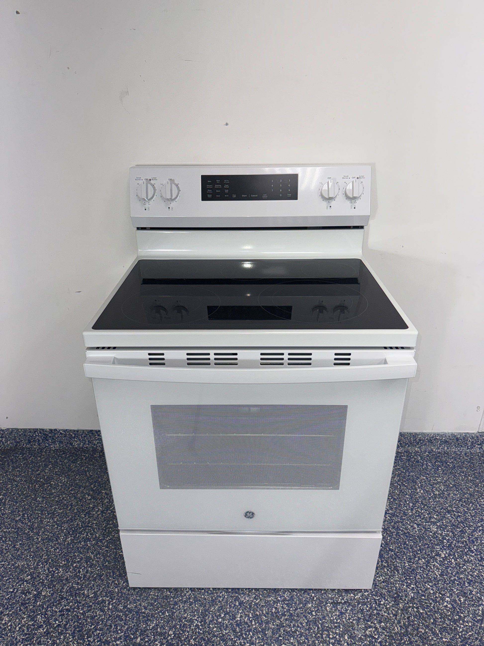 GE GRF600AV2WW electric range front view in Overland Park Kansas City area