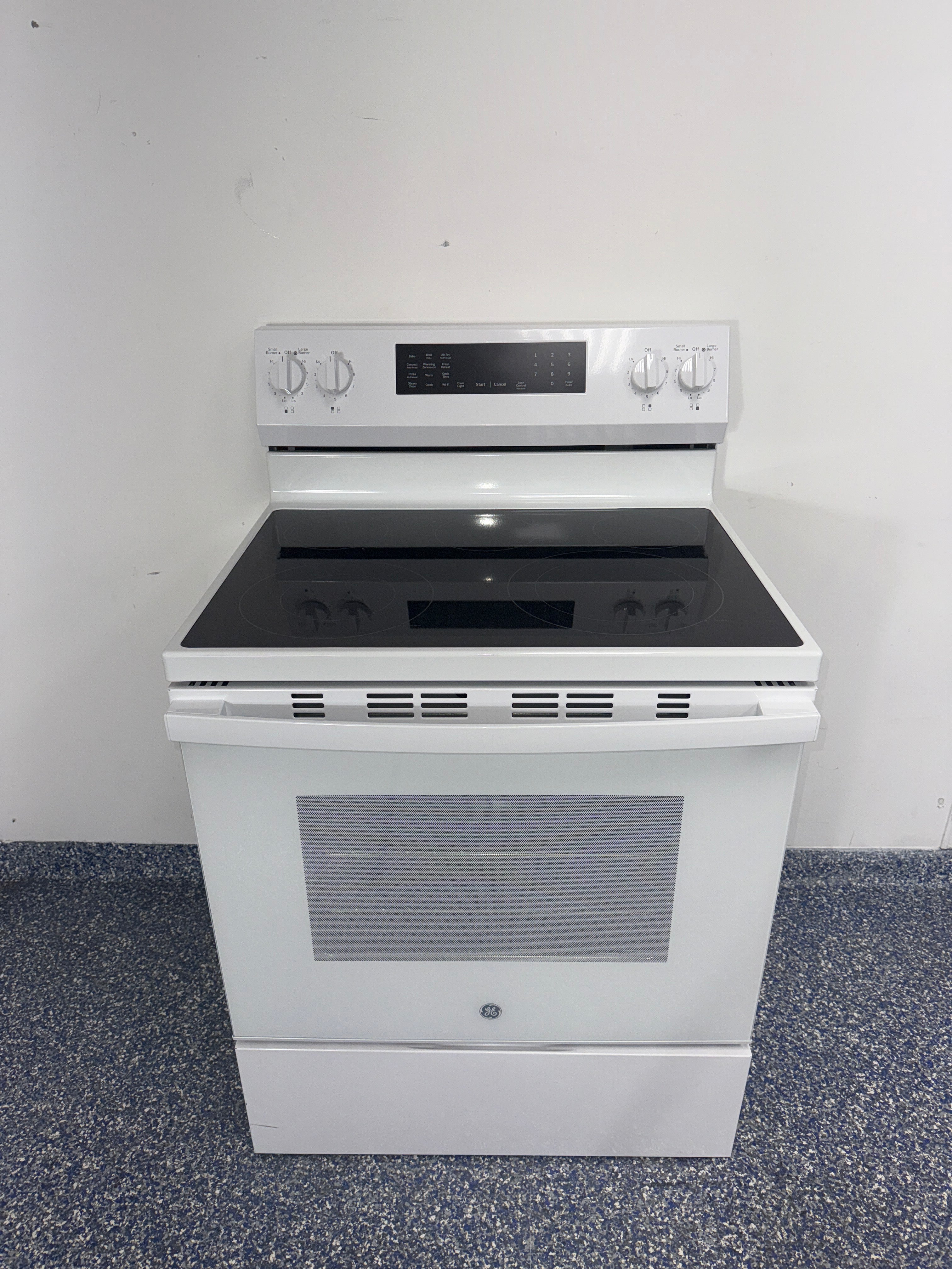 GE GRF600AV2WW electric range front view in Overland Park Kansas City area