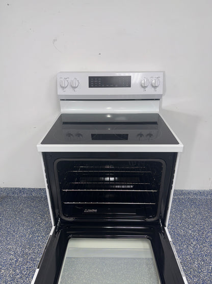 GE GRF600AV2WW electric range smooth cooktop view in Overland Park KS